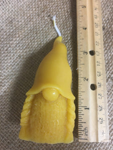 Female Gnome alongside ruler