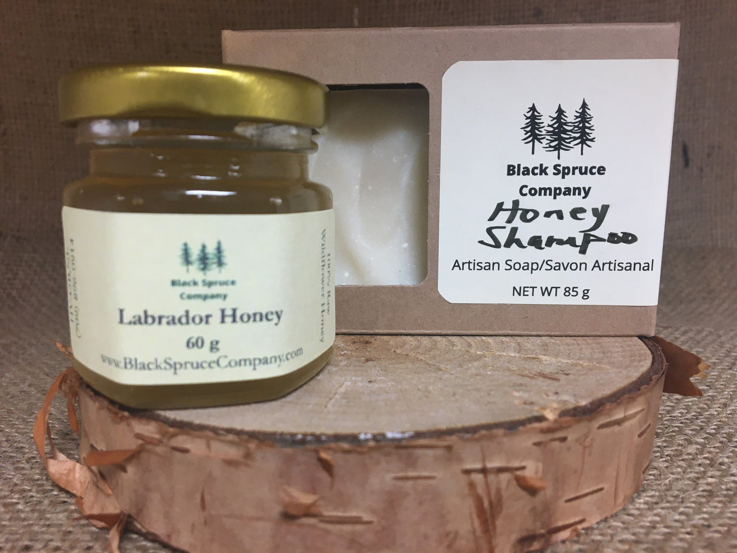 Honey Shampoo bar in box alongside small jar of honey