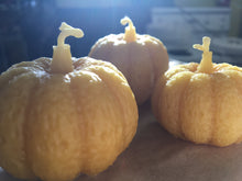 Load image into Gallery viewer, Beeswax Pumpkin Candles close up of medium candle