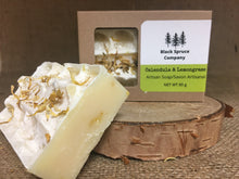 Load image into Gallery viewer, Calendula and Lemongrass Soap with close up of one soap